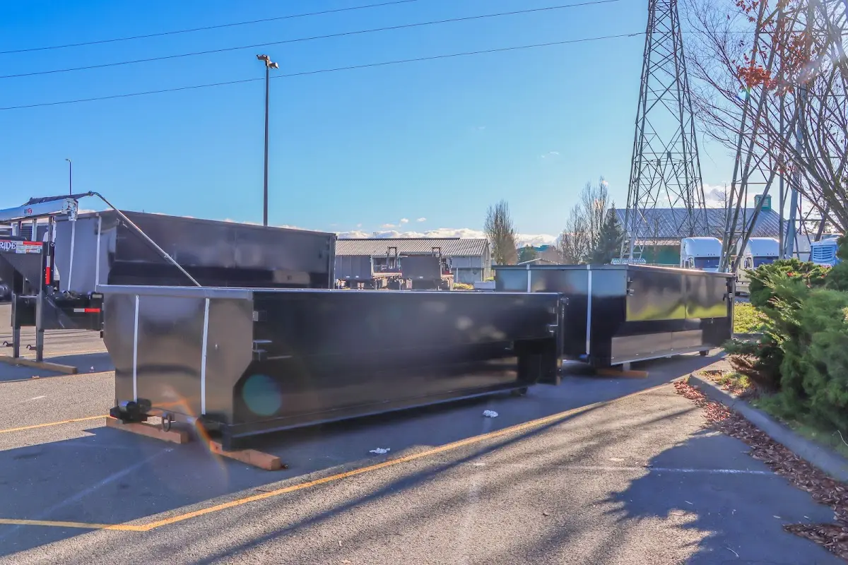 Roll-off dumpster ready for waste disposal at job site for Roofing Dumpster Rental in Pigeon Forge